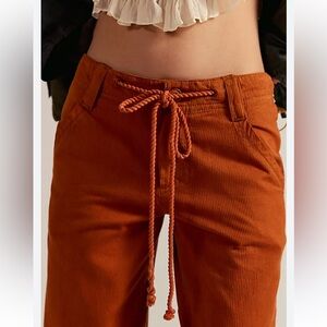 NWT retail $128 size 2 FREE PEOPLE wide leg trousers in burnt orange corduroy.